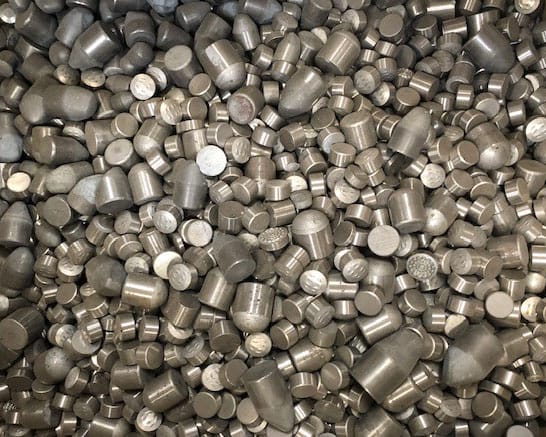 Tungsten carbide compacts recycling material
